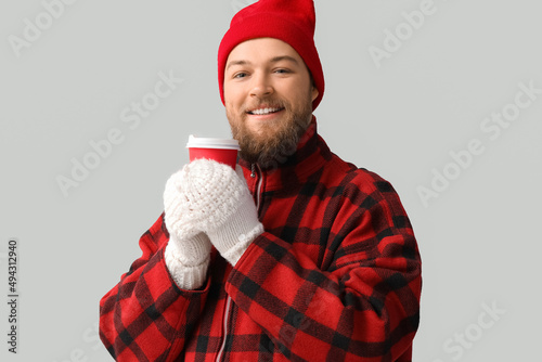 Young bearded man in warm g...