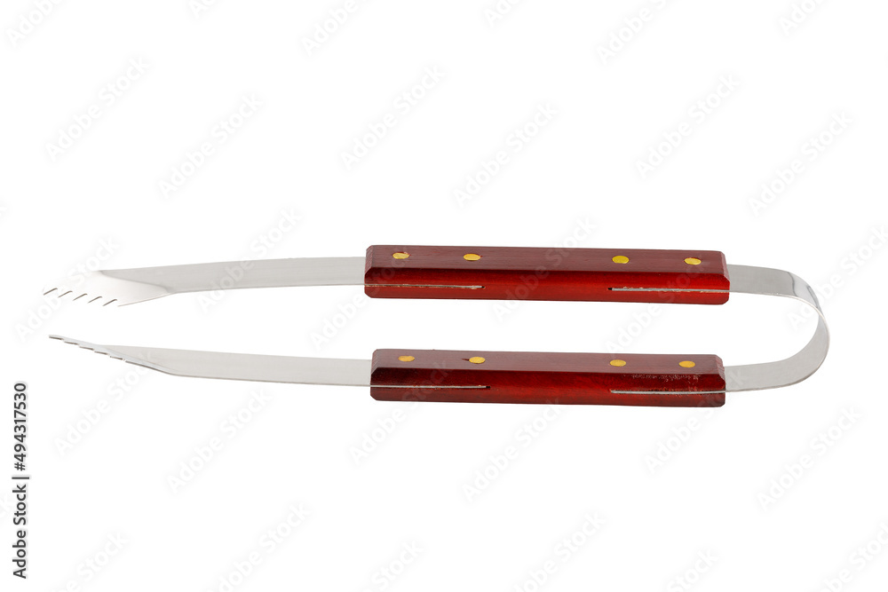 Barbecue tongs isolated on white. Steel, stainless grill tongs with wooden handle. Close up. Barbecue tongs isolated on white. Steel, stainless grill tongs with wooden handle. Close up.