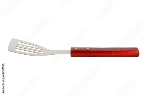 BBQ spatula isolated on white background. Stainless steel grill spatula with wooden handle. Close-up. photo