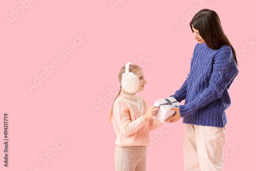 Happy mother giving to her ...