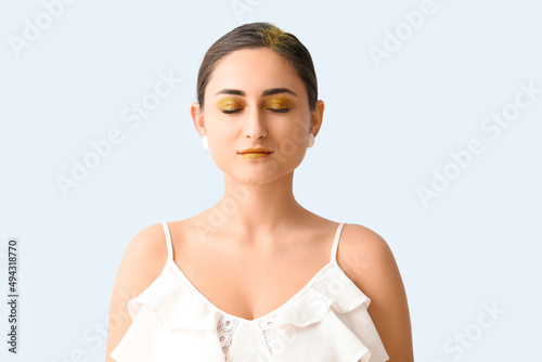 Attractive young woman with...