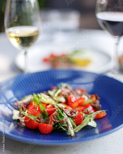traditional wine appetizers. white and red wine. restaurant serving. summer mood. shallow depth of field