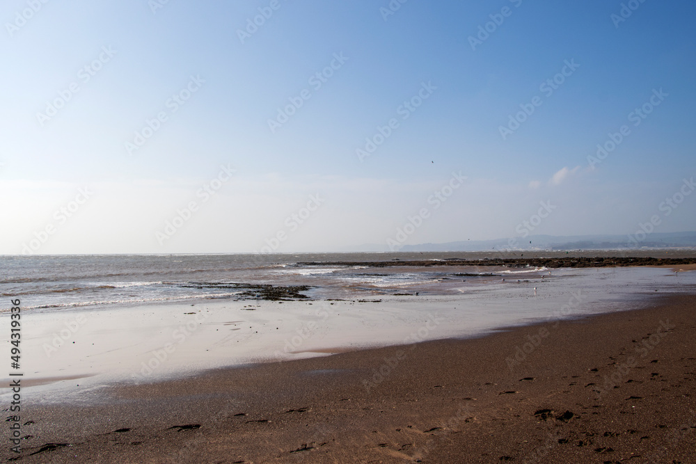 On the beach at Exmouth, Devon in late winter sunshine