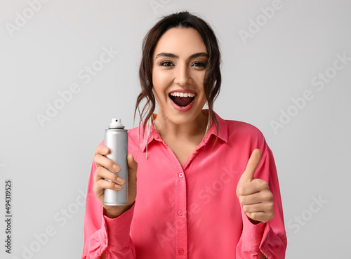 Pretty young woman with hai...