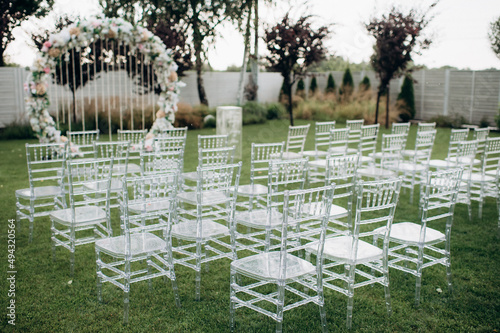 wedding ceremony preparation, transparent chiavari chairs 