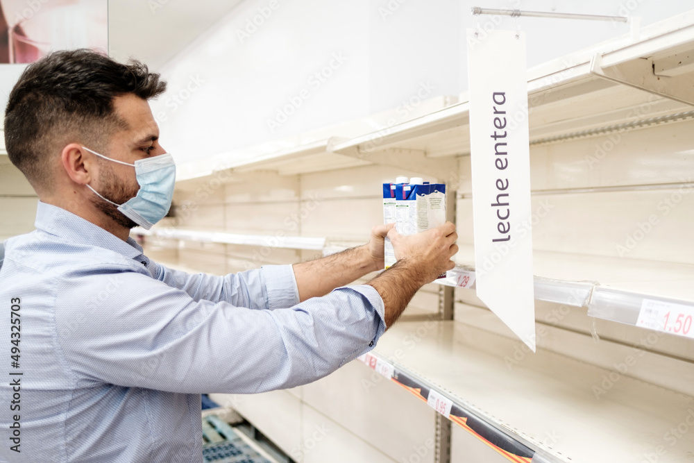 Milk empty shelf in the supermarket in Spain due to panic buying