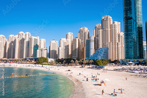 Photography Beautiful modern residential buildings with beach in foreground
