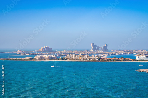 Fototapeta Naklejka Na Ścianę i Meble -  Beautiful port with city at jumeirah island against clear blue sky