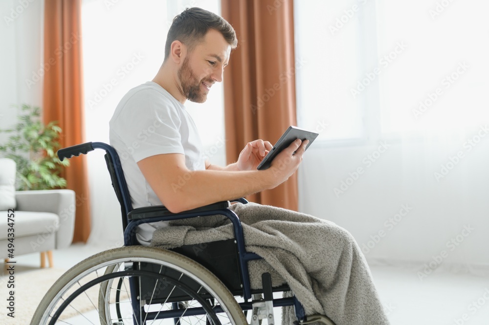 Enthusiastic disabled man having a great morning Enthusiastic disabled man having a great morning