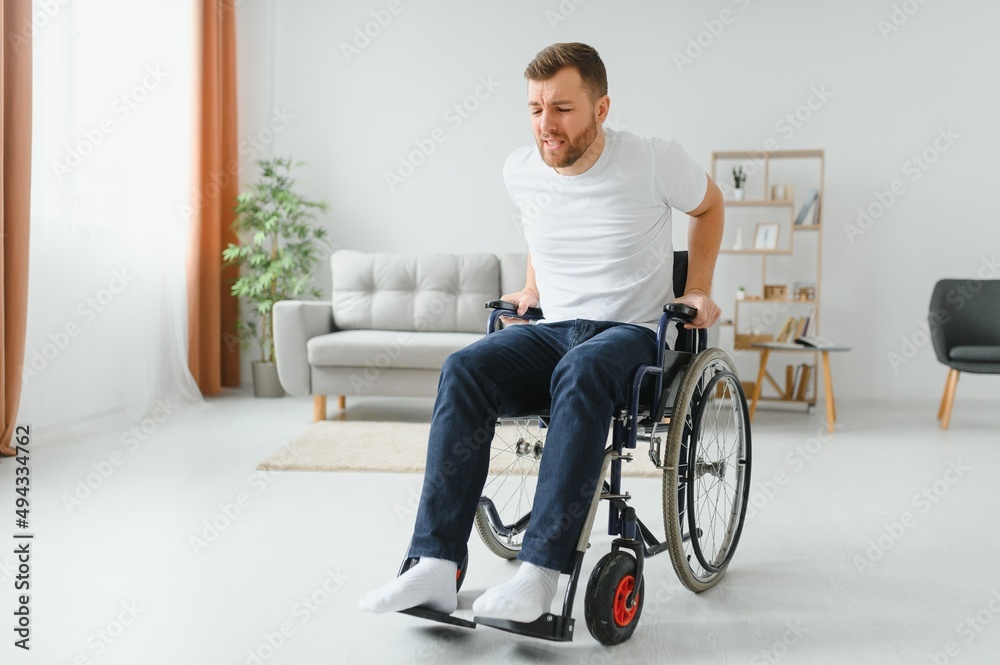 Capable disabled trying to get up from the wheelchair Capable disabled trying to get up from the wheelchair