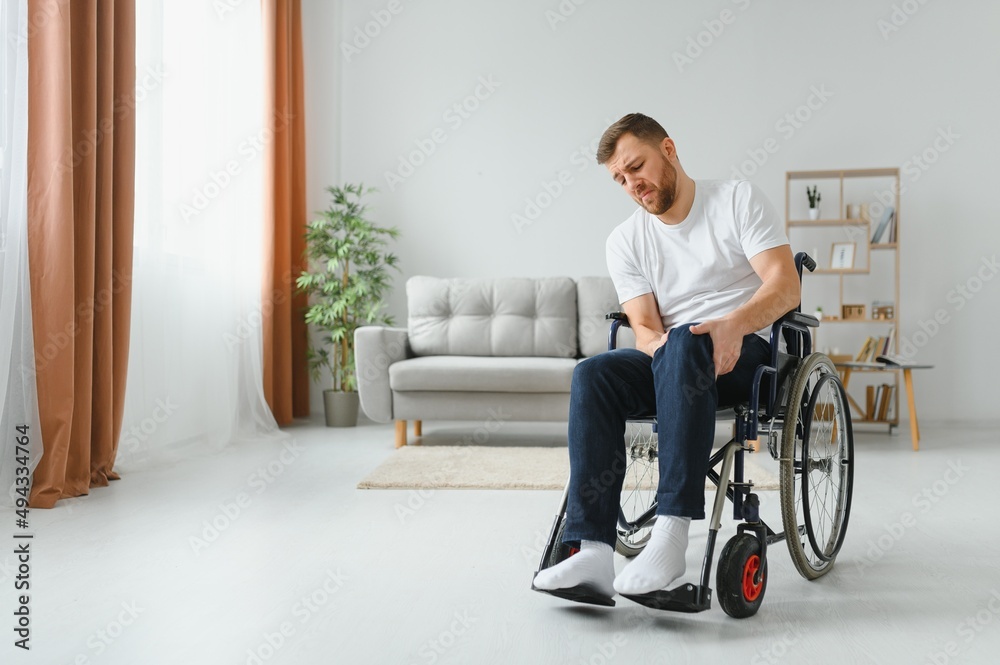 Capable disabled trying to get up from the wheelchair Capable disabled trying to get up from the wheelchair