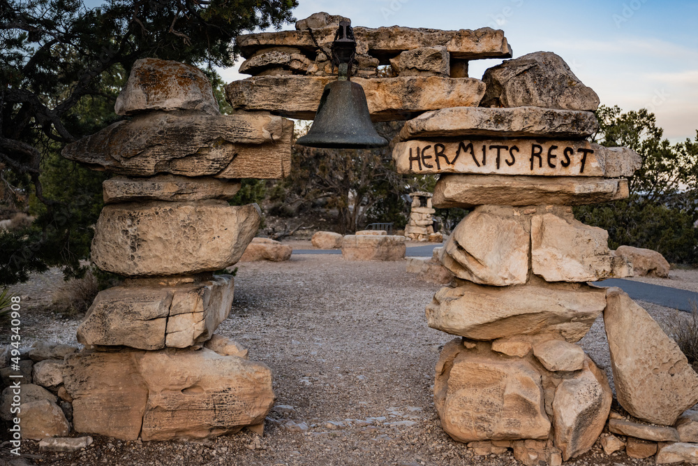 Hermits Rest Sign and Bell On Stacked Stone Arch