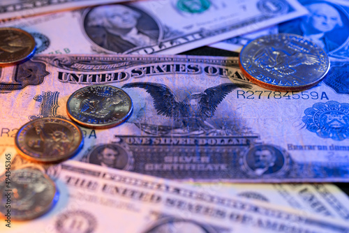 Black Eagle Dollar banknote with Dollar coins on top. US Dollar currency