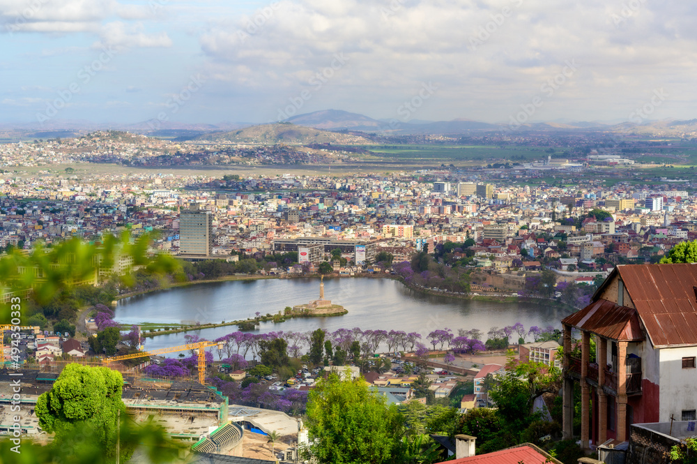 Aerial view of lake Anosy and the skyline of the city of Antananarivo in  bright sunlight, Madagascar Stock Photo | Adobe Stock