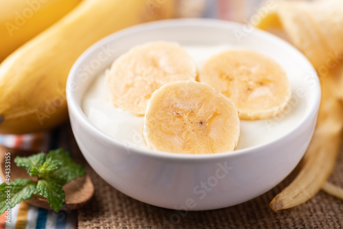 Yogurt with banana in bowl, Healthy eating