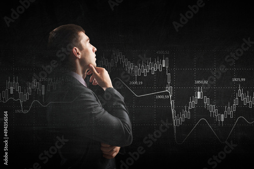Business graph and trade monitor . Mixed media