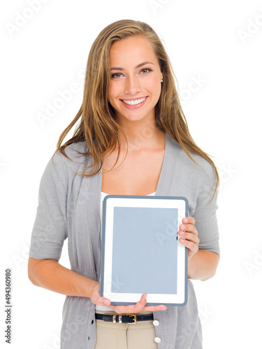 This makes my life so much easier. Studio portrait of an attractive young woman holding a digital tablet.