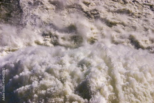 Close up of roaring water gushing from pressure outlet at Lake Hume dam