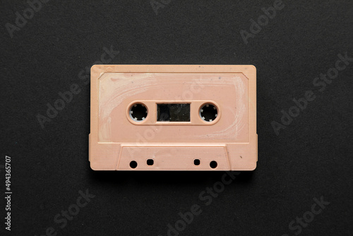 Vintage audio cassette on black background