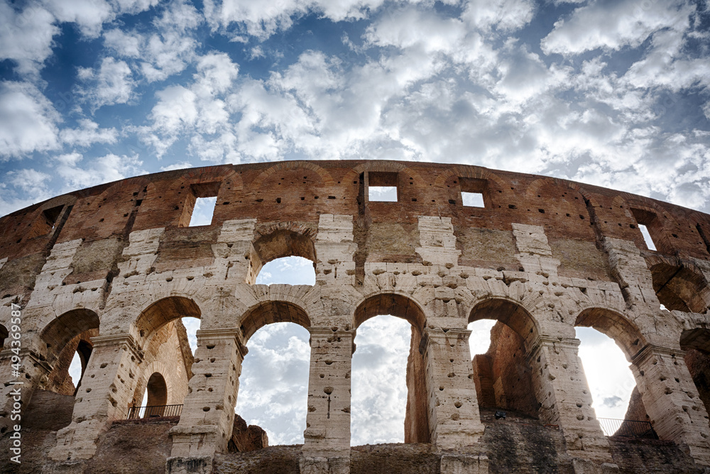 Detail of colosseum wall against sky
