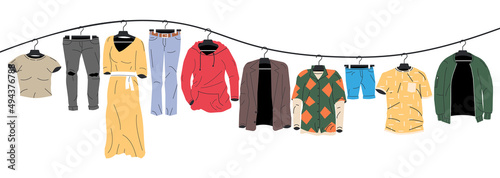 Mens and Womans Clothes on Hanger.