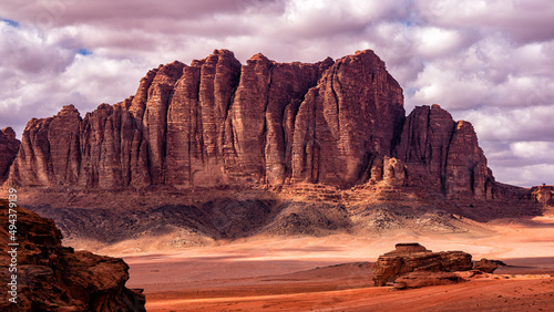 Fototapeta Naklejka Na Ścianę i Meble -  An outstanding desert-mountain landscape. Wadi Rum Protected Area, Jordan.