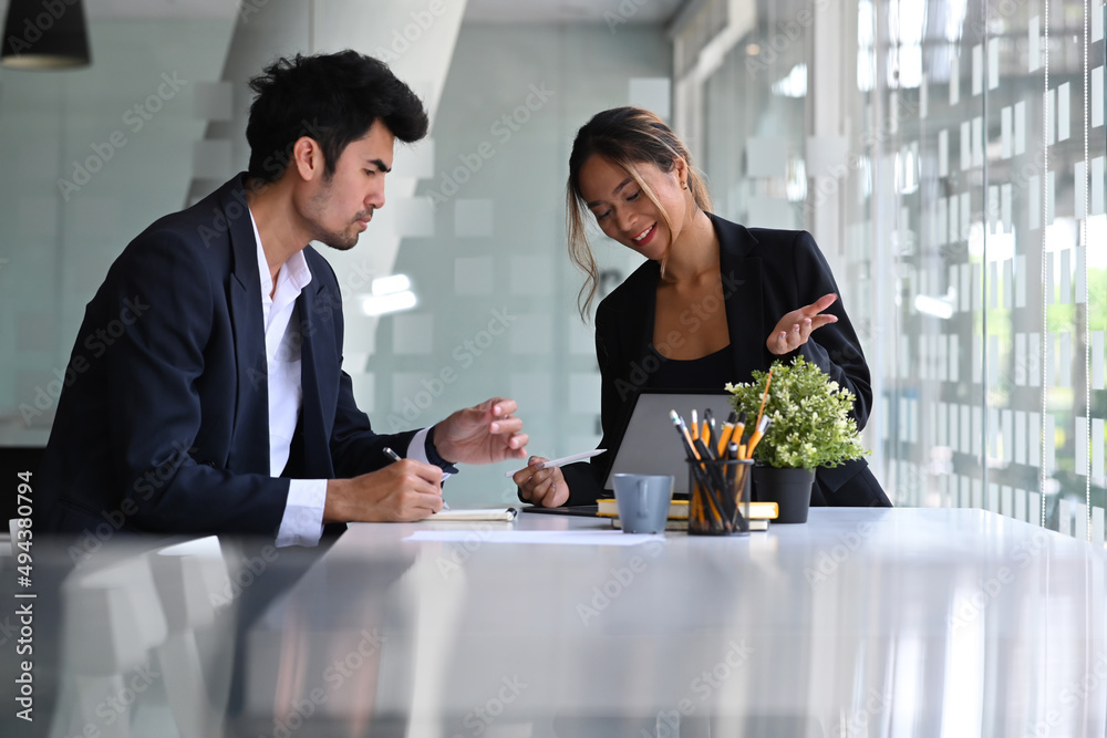 Confident hr manager talking and introduction company to male applicant. Confident hr manager talking and introduction company to male applicant.