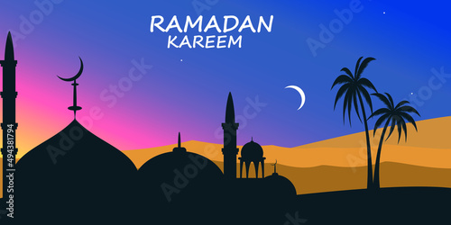 Ramadan sunset with mosque background palm tree and desert