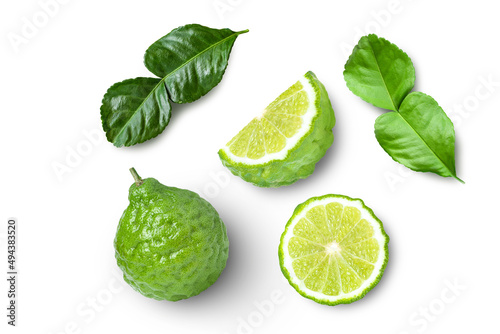 Bergamot fruit with cut in half sliced and leaf isolated on white background. photo