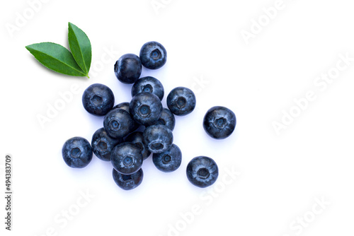 Group of fresh Blueberry fruit with green leaves isolated on white background. Top view. Flat lay. © NIKCOA