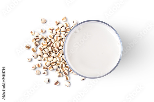 Millet milk and white Job's tears (Adlay millet or pearl millet) isolated on white background. Top view. Flat lay.