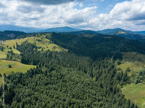 Green Ukrainian Carpathians mountains in summer. Aerial drone view.