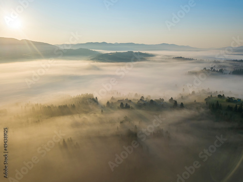 Morning fog in the Ukrainian Carpathians. Aerial drone view.