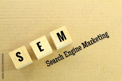 wooden cubes with the letters SEM or the word search engine marketing