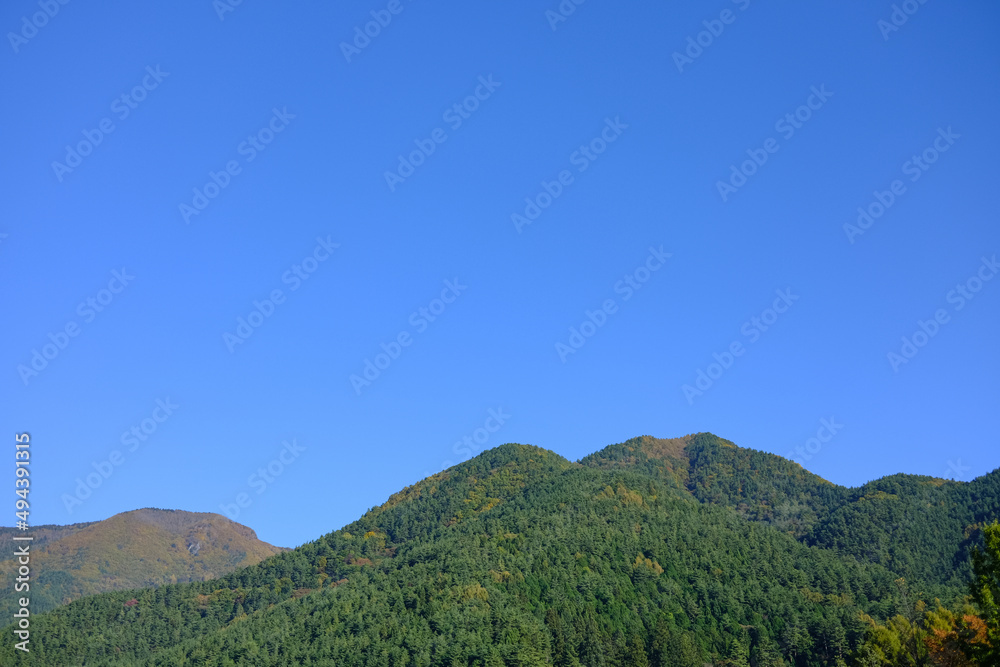 Nature landscape, beautiful panorama of green hills with blue sky background in Yamanashi, Japan. Nature landscape, beautiful panorama of green hills with blue sky background in Yamanashi, Japan.