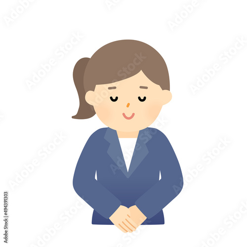 おじぎをするスーツの女性