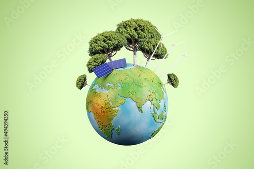 Creative globe with trees and solar panels on green background. Energy and sustainable concept. 3D Rendering.
