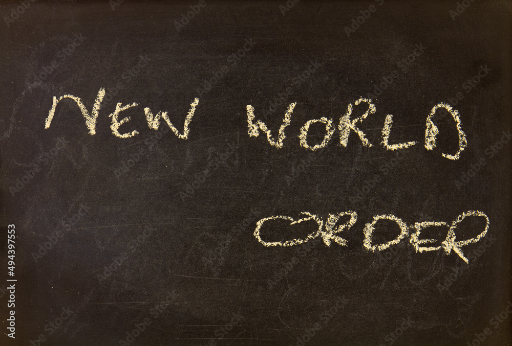 Fototapeta premium The term NEW WORLD ORDER visually displayed on a blackboard with copy space