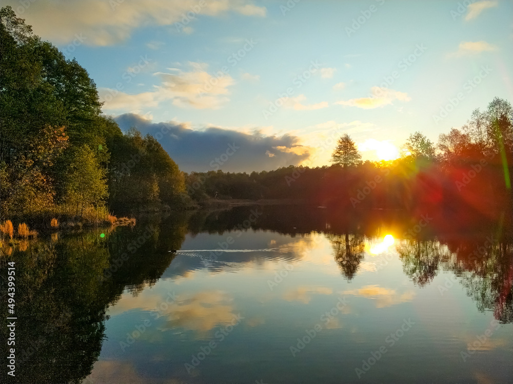 Dawn of the sun on a blue lake in Kazan.