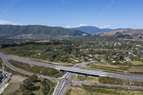 waikanae village and hills with motorway interchange photo