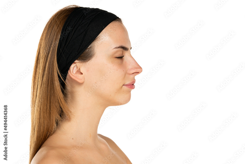 Side view portrait of young woman closed eyes Side view portrait of young woman closed eyes