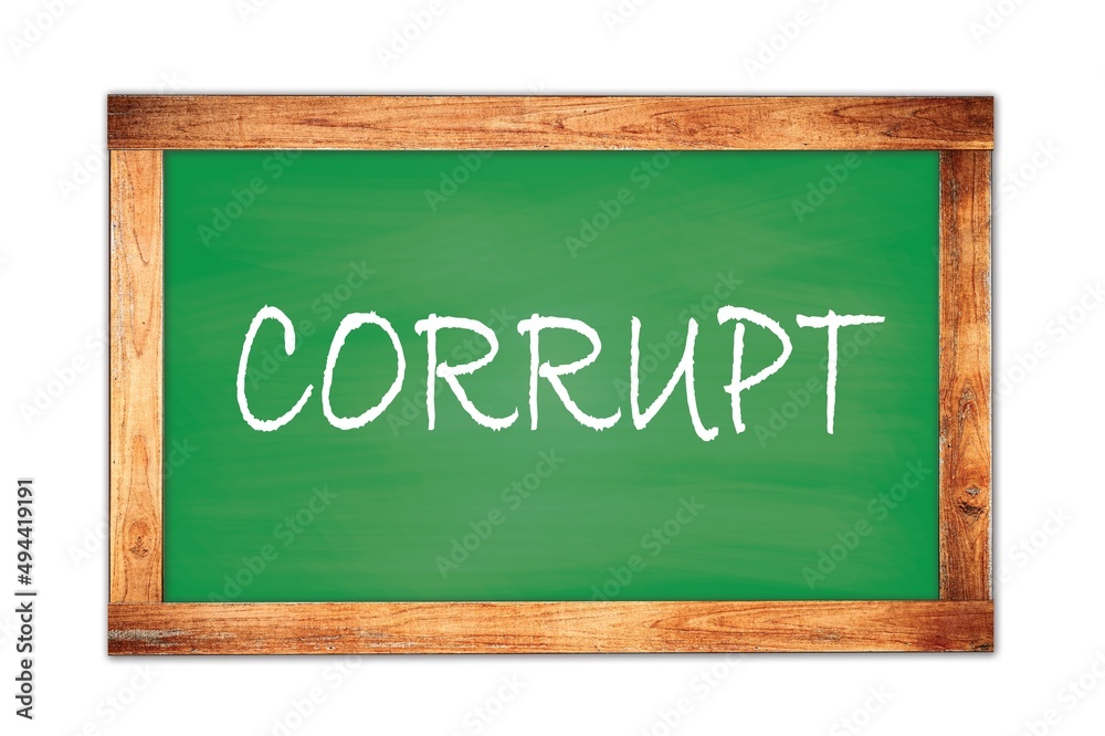 CORRUPT text written on green school board. CORRUPT text written on green school board.