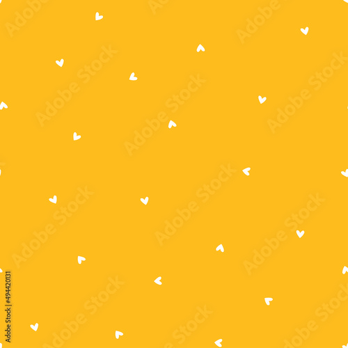 White tiny hearts seamless pattern with yellow background.