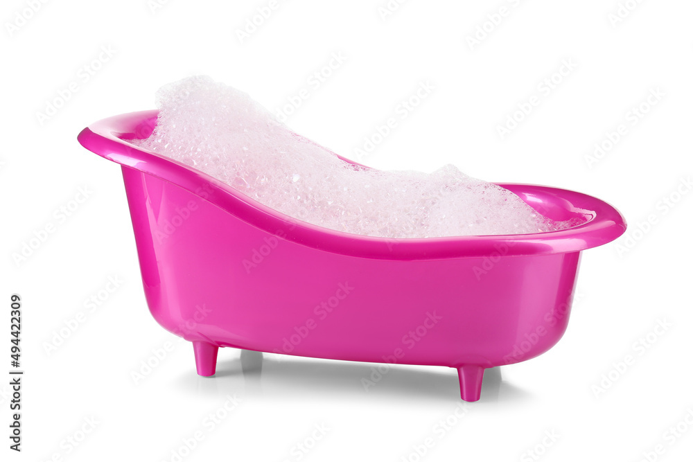 Pink toy bathtub with foam isolated on white Pink toy bathtub with foam isolated on white