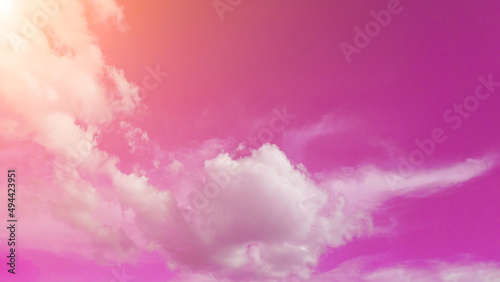 Photography The pastel pink sky has a natural glow with white clouds for the background or illustration