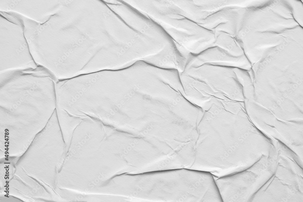 Fototapeta premium Blank white crumpled and creased paper poster texture background