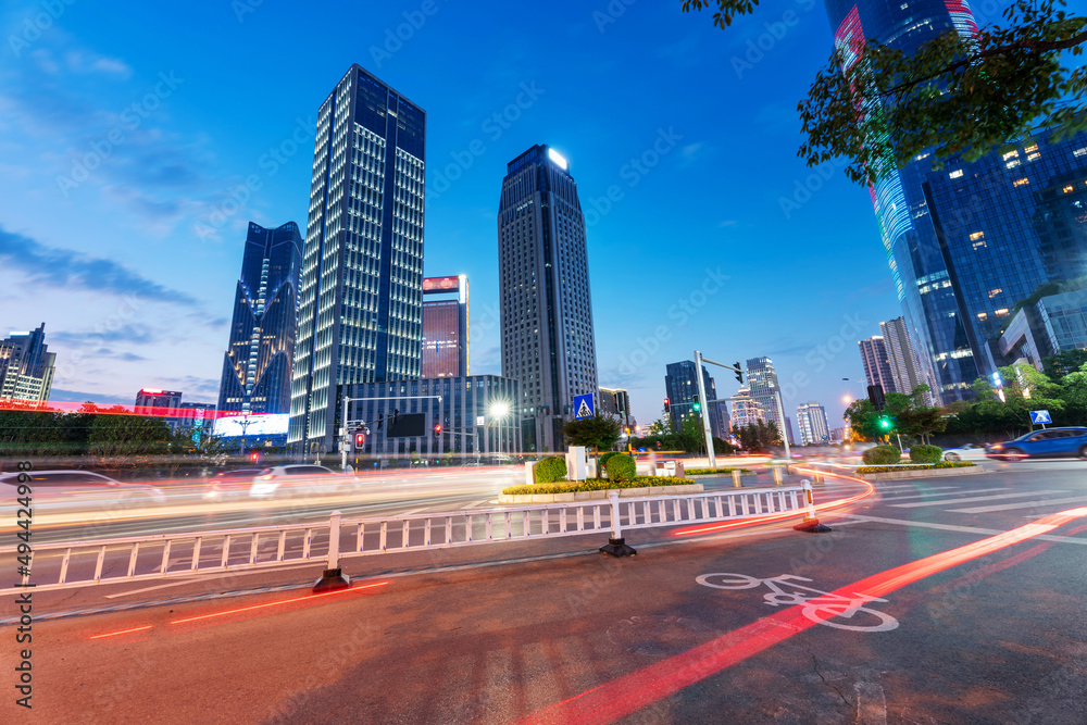 Fototapeta premium the light trails on the modern building background in shanghai china
