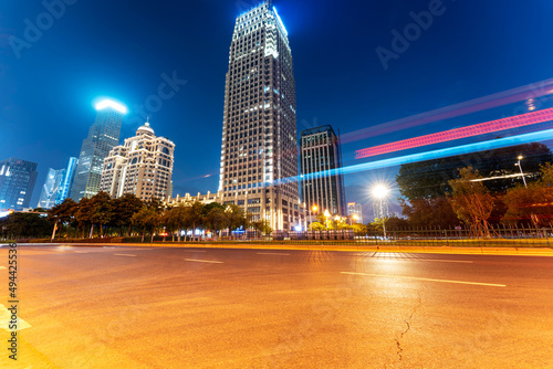 the light trails on the modern building background in shanghai china. © gjp311