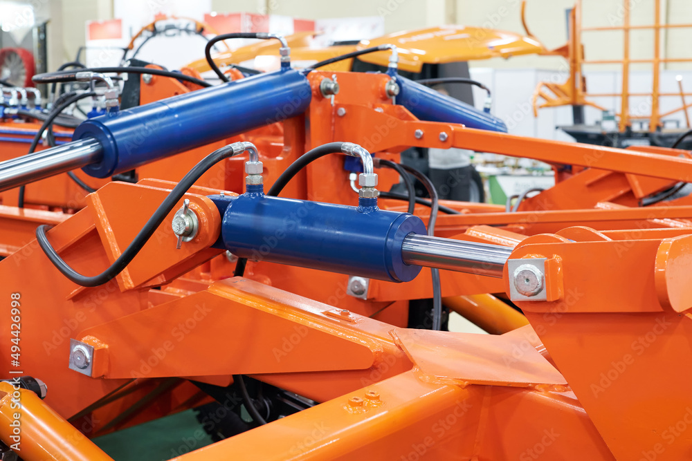 Closeup of a hydraulic control system for an attachment mechanism. Closeup of a hydraulic control system for an attachment mechanism.