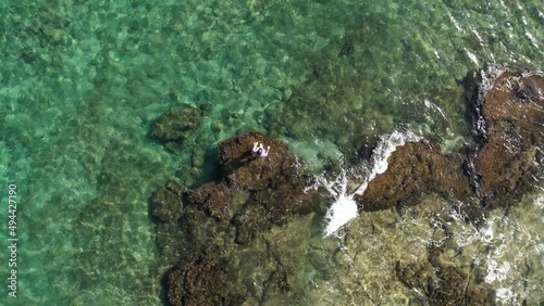 A natural pool is hewn in a natural rock near the shoreline of Haifa, Israel. photo